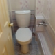 How can you hide pipes in a toilet?