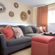 How to decorate the wall in the living room above the sofa?