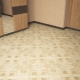 Tiles on the floor in the corridor: an overview of varieties, design and selection