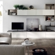 Wall with a table in the living room: features and selection criteria