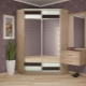 Corner wardrobes in the hallway: design, types and selection