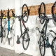 Bicycle mounts on the wall: types, tips for choosing and installing