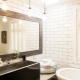 At what height should the bathroom mirror be hung?