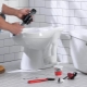 At what distance from the wall should the toilet be placed?
