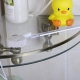 Corner shelves in the bathroom: varieties, tips for choosing