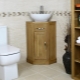 Corner sinks with a vanity unit in the bathroom: varieties, recommendations for choosing