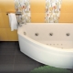 Corner baths in a small bathroom