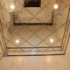 Mirrored ceiling in the bathroom: pros and cons, design options