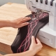 Why does the sewing machine skip stitches when sewing, and what should I do?