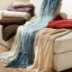 Choosing a bedspread on the sofa
