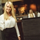 Who is a restaurant hostess and what are his responsibilities?