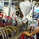 Who is an extruder driver and what does he do?