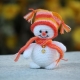 How to tie an amigurumi snowman?