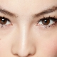 Eyelash extensions for overhanging eyelids
