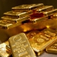 How much does an ounce of gold weigh and where is it applied?