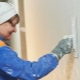 Who is a painter-plasterer and what does he do?