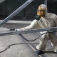 Who is a sandblaster and what are his responsibilities?