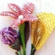 Weaving flowers from newspaper tubes