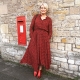 How to dress for an anniversary for a 50-year-old woman?