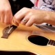 How to change strings on a guitar?