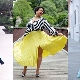 How to choose a pleated skirt for full girls and what to wear with it?