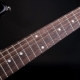 What are the marks (dots) on the guitar neck for?