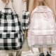 Backpacks in a cage
