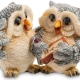 What do the owl statuettes symbolize and where to put them?