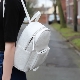 What are white backpacks and how to make bows with them?