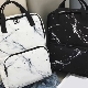 Features of marble print backpacks