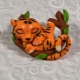 How can you mold a tiger from plasticine?