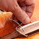 How to string the strings on a classical guitar?