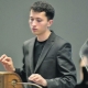 What is a theremin and how is it played?
