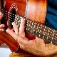 What is a guitar harmonic and how to play it?