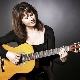 How to hold the guitar correctly?