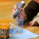 How do I turn on the 3D pen?