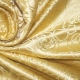 What does brocade look like and what is sewn from it?