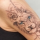 Features of a lion tattoo and their variety