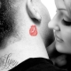 What do Kiss tattoos mean and where to place them?
