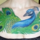 What does the Peacock tattoo symbolize?