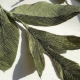 Making corrugated paper leaves