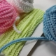 Features of braid with pom-poms