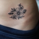 Variety of tattoos on the stomach