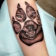Wolf paw tattoo: meaning and sketches