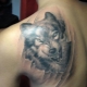 Wolf grin tattoo