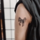 Bow tattoo