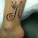 Tattoo in the form of the letter A