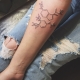 Tattoo in the form of a serotonin and dopamine formula