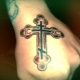 Tattoo in the form of an Orthodox cross