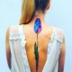 Tattoos along the spine for girls